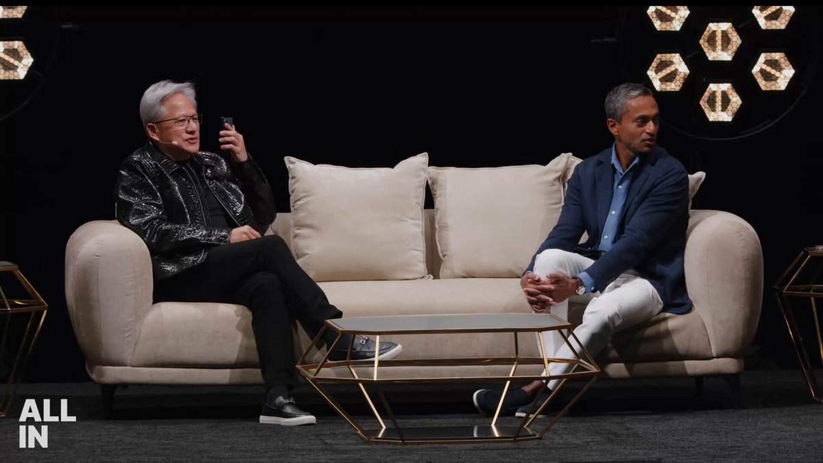All-In Summit 무대의 Jensen Huang